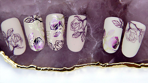 Purple flowers prepared with layered stamping